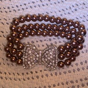 Vintage faux park with rhinestone bow